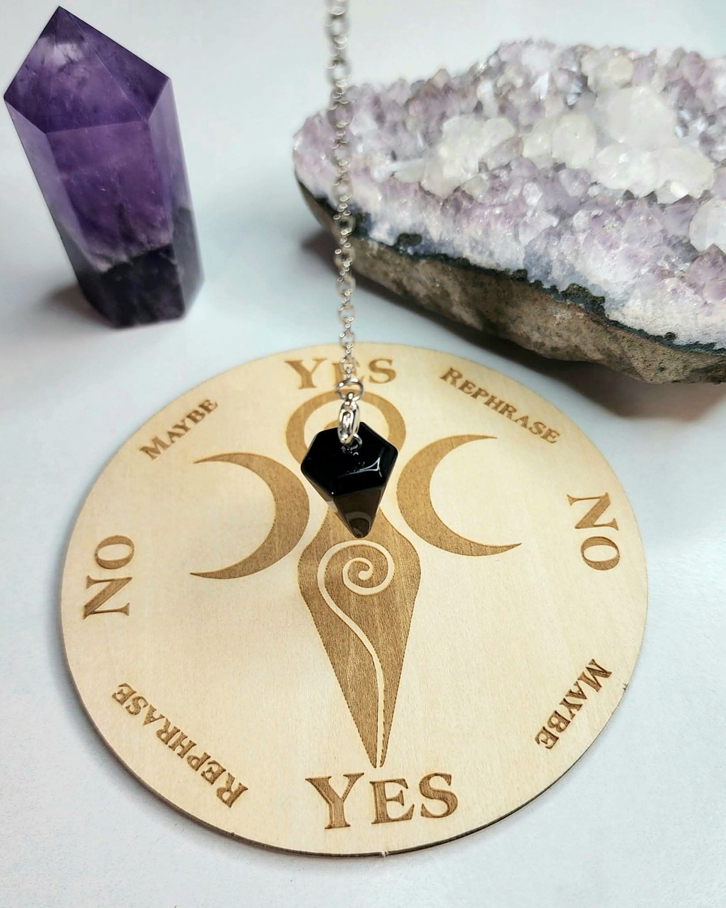 Intuitively Selected Crystal Pendulum
